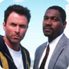 Tim Daly and Mykelti Williamson from the 2000 version of THE FUGITIVE